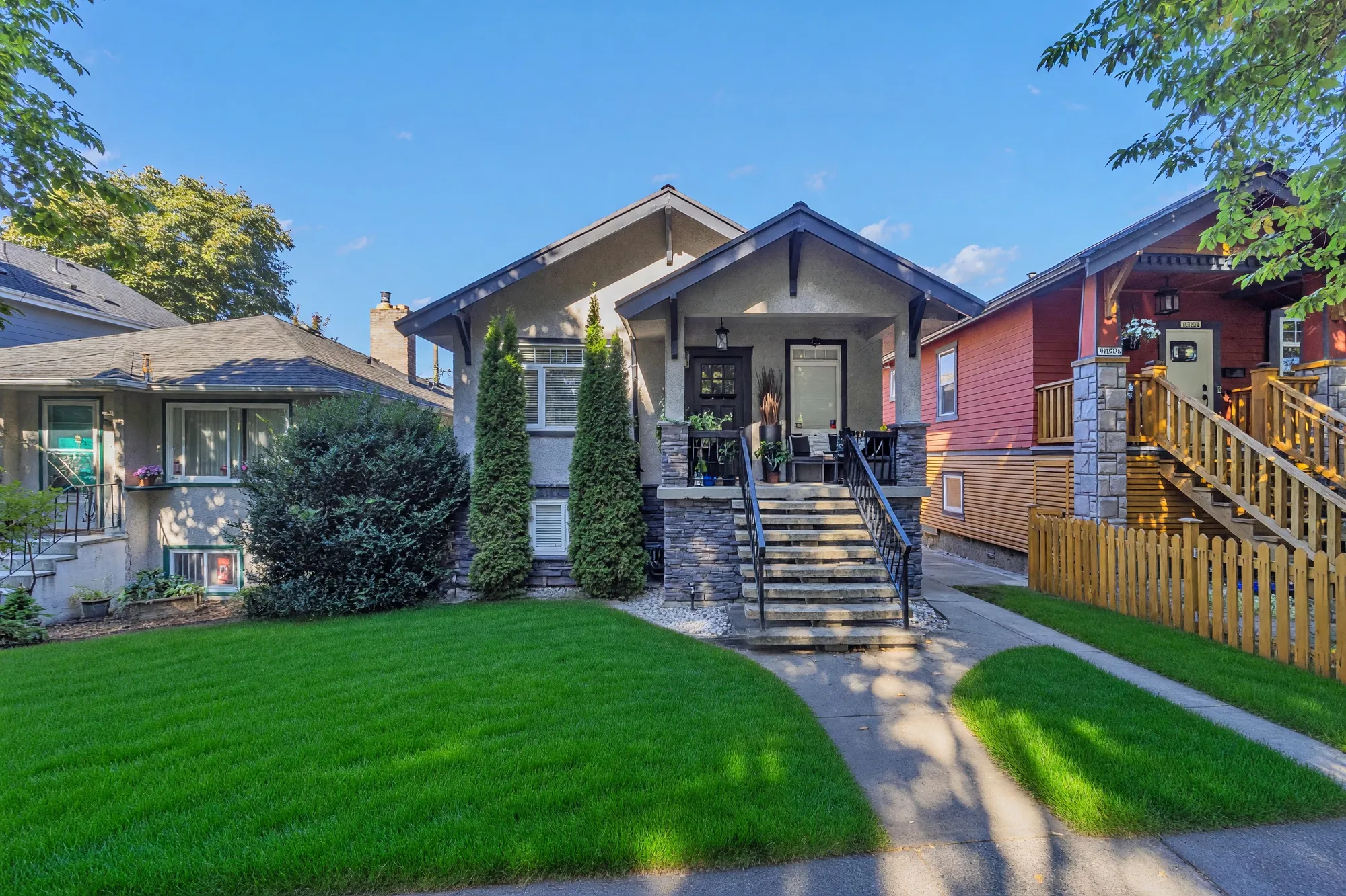 The same view of the front with the lawn shown green and even